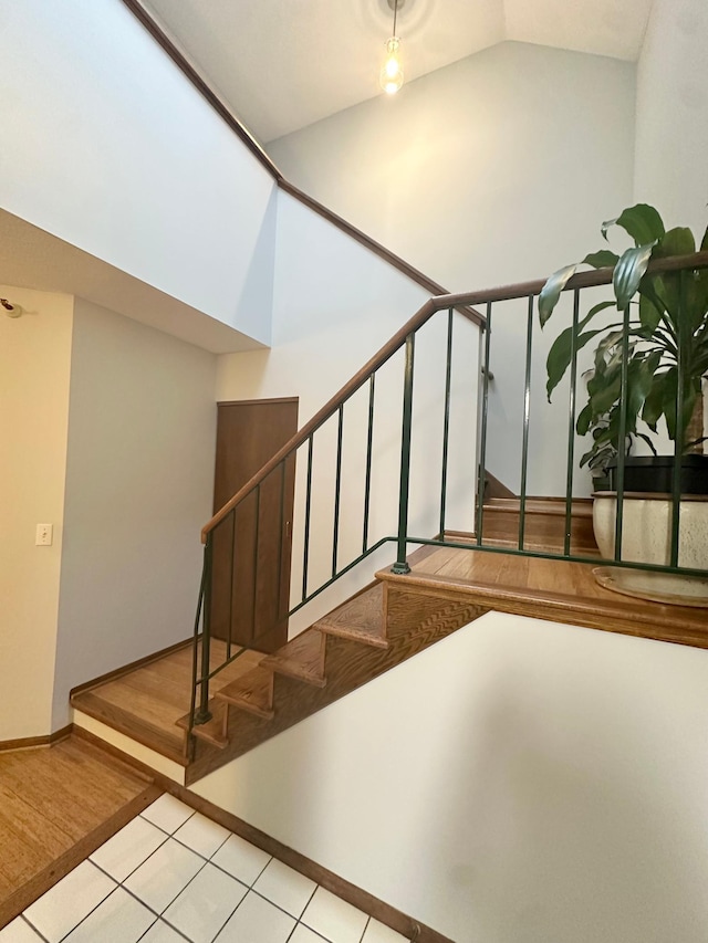 7631 Edinborough Way Unit 5319, Edina, MN 55435 - staircase with lofted ceiling and tile patterned floors