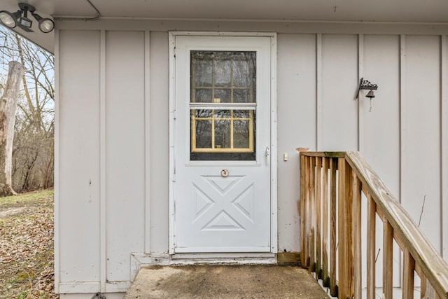 property entrance with board and batten siding