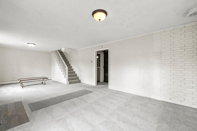 interior space featuring stairway and carpet floors