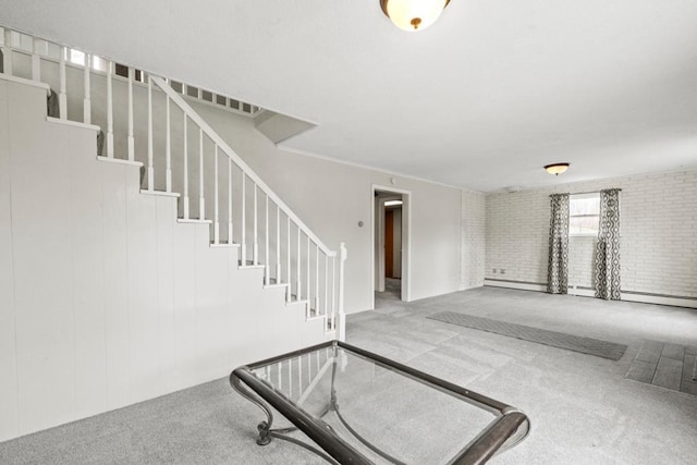 interior space with carpet flooring and stairs