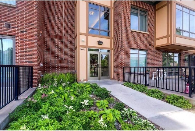 1070 Grandview Ct NE Unit 413, Columbia Heights, MN 55421 - entrance to property featuring brick siding and stucco siding