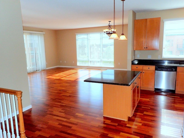 1070 Grandview Ct NE Unit 413, Columbia Heights, MN 55421 - kitchen with dark wood-type flooring, dark countertops, plenty of natural light, and stainless steel dishwasher