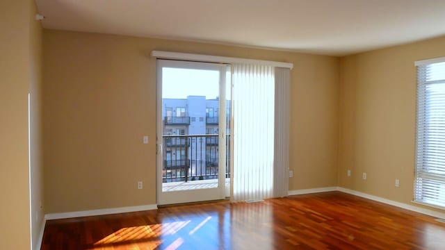 1070 Grandview Ct NE Unit 413, Columbia Heights, MN 55421 - empty room with baseboards and wood finished floors