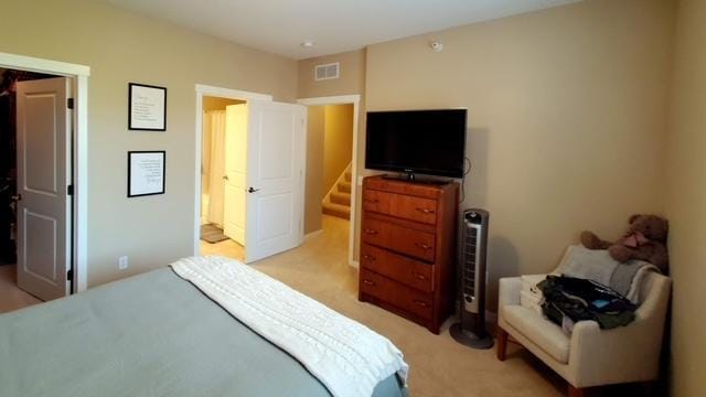 1070 Grandview Ct NE Unit 413, Columbia Heights, MN 55421 - bedroom with visible vents and light colored carpet