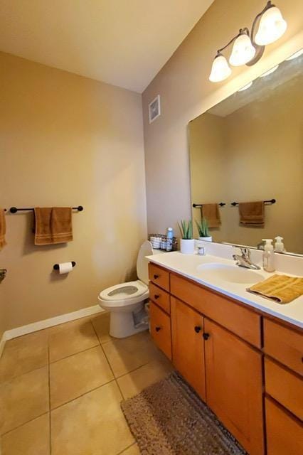1070 Grandview Ct NE Unit 413, Columbia Heights, MN 55421 - bathroom with toilet, vanity, tile patterned floors, and visible vents