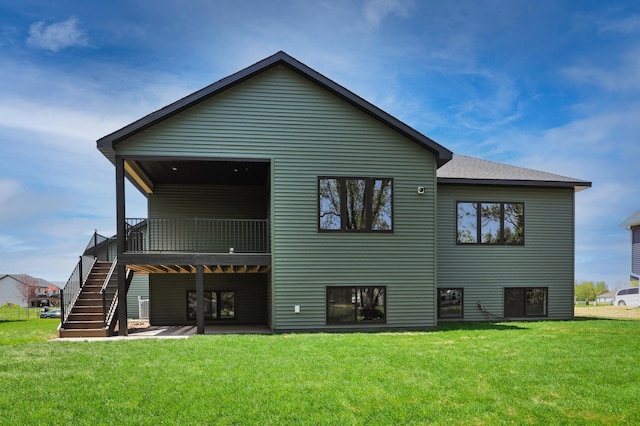1504 14th Ave NE, Kasson, MN 55944 - rear view of property featuring a yard, stairway, a wooden deck, and a patio area