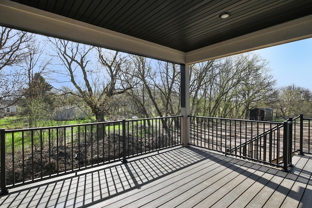 1504 14th Ave NE, Kasson, MN 55944 - wooden terrace featuring view of scattered trees