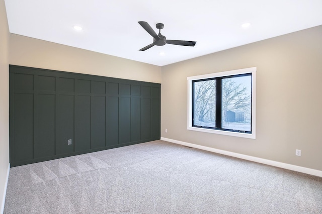 1504 14th Ave NE, Kasson, MN 55944 - empty room with light colored carpet, a ceiling fan, baseboards, and recessed lighting