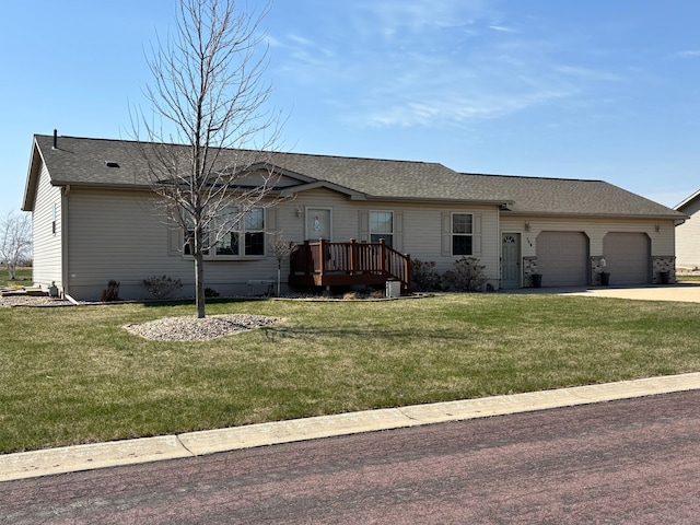 154 Pond Dr, Jackson, MN 56143 - single story home with roof with shingles, a garage, concrete driveway, and a front lawn