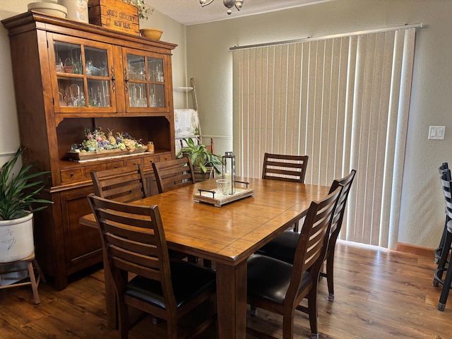 154 Pond Dr, Jackson, MN 56143 - dining room with a textured wall and dark wood finished floors
