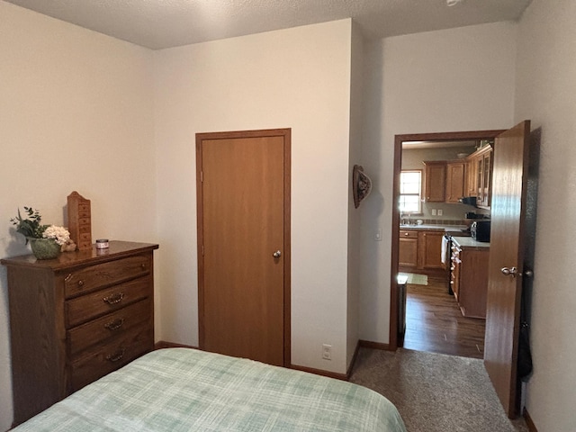 154 Pond Dr, Jackson, MN 56143 - carpeted bedroom featuring baseboards