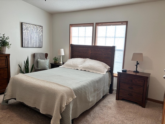 154 Pond Dr, Jackson, MN 56143 - bedroom with light carpet and baseboards