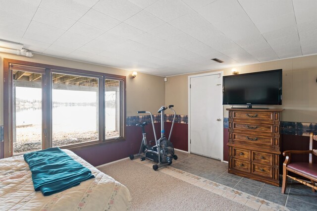 bedroom featuring tile patterned floors