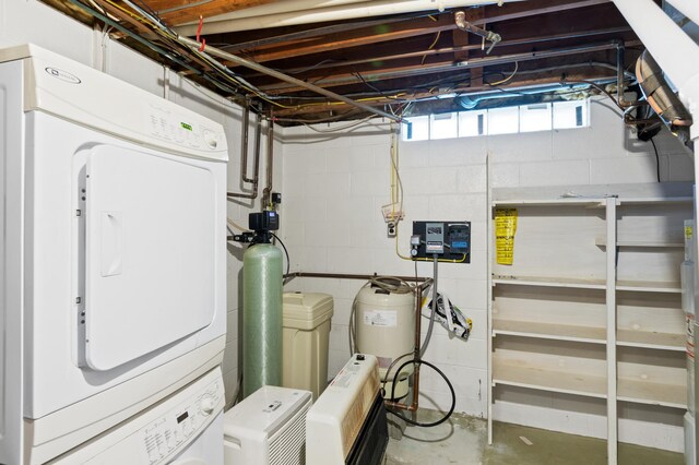 interior space featuring stacked washer / drying machine
