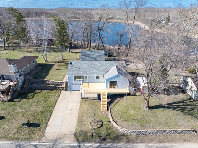 drone / aerial view with a water view