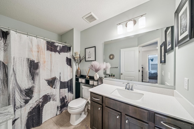 4271 Corn Silk Ln, Woodbury, MN 55129 - full bathroom featuring tile patterned flooring, toilet, vanity, a textured ceiling, and a shower with shower curtain