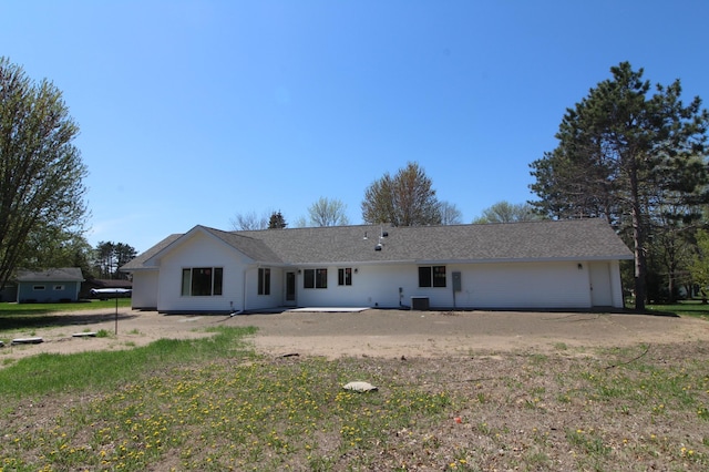 view of front of house featuring cooling unit