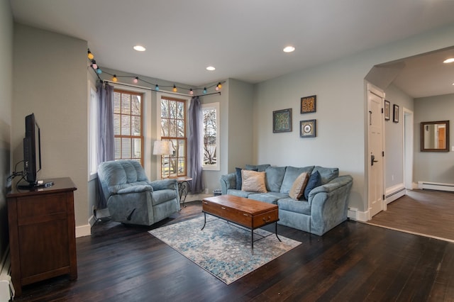 311 Prairie St, Lake City, MN 55041 - living room featuring baseboards, baseboard heating, dark wood-style floors, and recessed lighting
