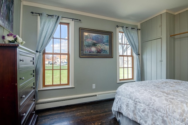 311 Prairie St, Lake City, MN 55041 - bedroom featuring a baseboard radiator, crown molding, and dark wood-style floors