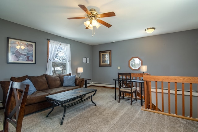 311 Prairie St, Lake City, MN 55041 - carpeted living area with a baseboard heating unit, a baseboard radiator, baseboards, and ceiling fan