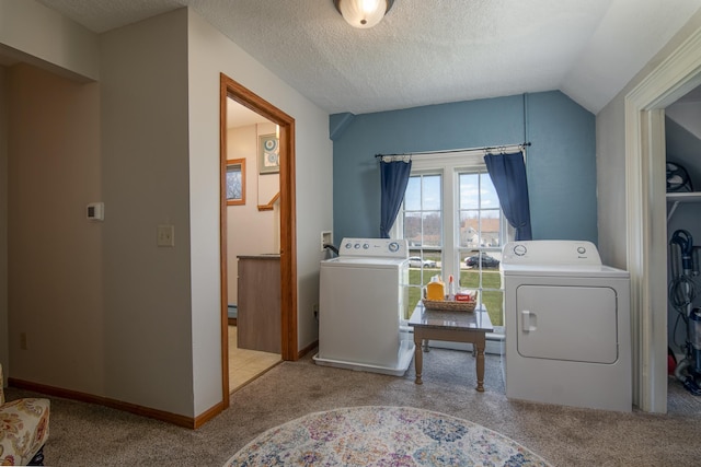 311 Prairie St, Lake City, MN 55041 - laundry area featuring a textured ceiling, carpet flooring, laundry area, and washer and clothes dryer