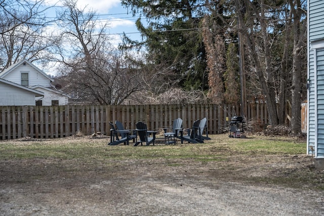 311 Prairie St, Lake City, MN 55041 - view of yard featuring a fire pit and fence