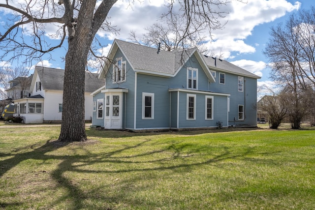 311 Prairie St, Lake City, MN 55041 - rear view of house featuring a yard