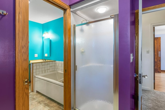 bathroom with a shower stall