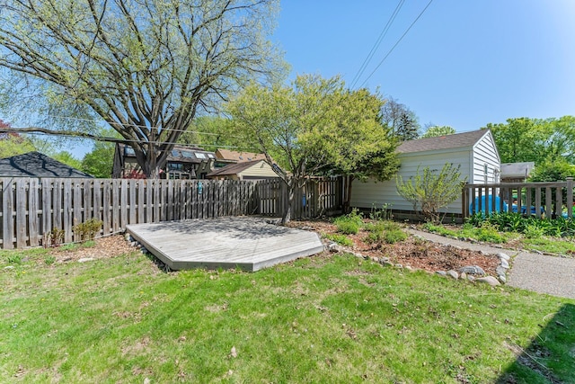 view of yard featuring a wooden deck
