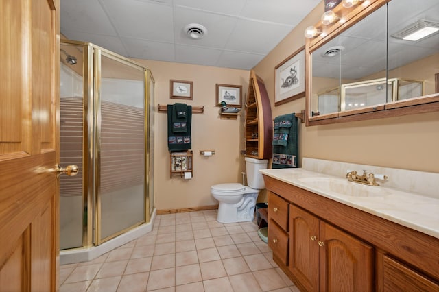 16227 Bay Dr, Pengilly, MN 55775 - full bath featuring a shower stall, a drop ceiling, tile patterned floors, toilet, and vanity