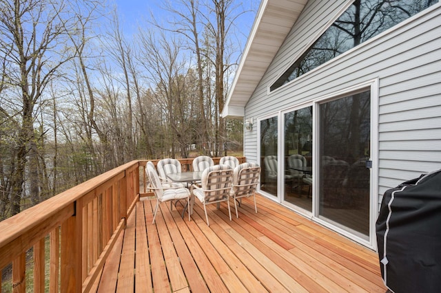 16227 Bay Dr, Pengilly, MN 55775 - wooden terrace featuring outdoor dining area and a grill