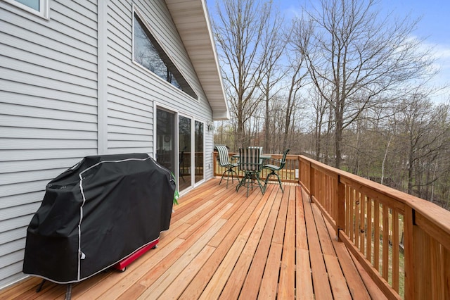16227 Bay Dr, Pengilly, MN 55775 - deck featuring outdoor dining space and area for grilling