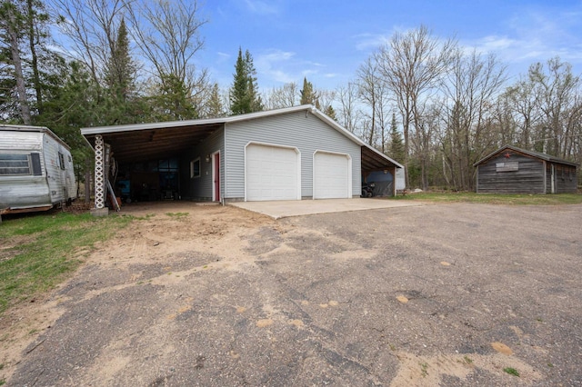 16227 Bay Dr, Pengilly, MN 55775 - garage with a detached garage
