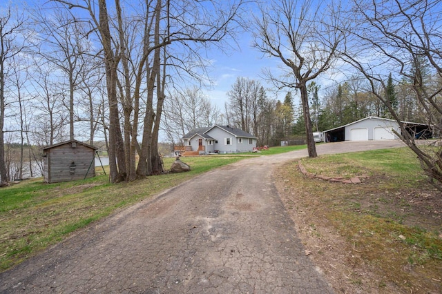 16227 Bay Dr, Pengilly, MN 55775 - view of asphalt driveway