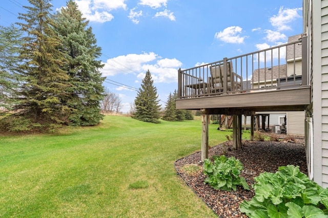 view of yard featuring a wooden deck