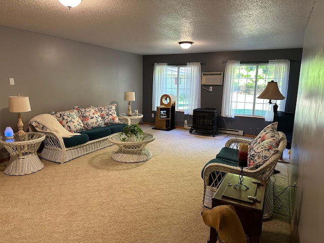 carpeted living area featuring a baseboard heating unit, an AC wall unit, a textured ceiling, and a wood stove