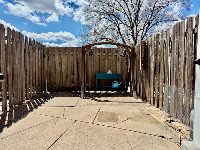 view of patio with fence