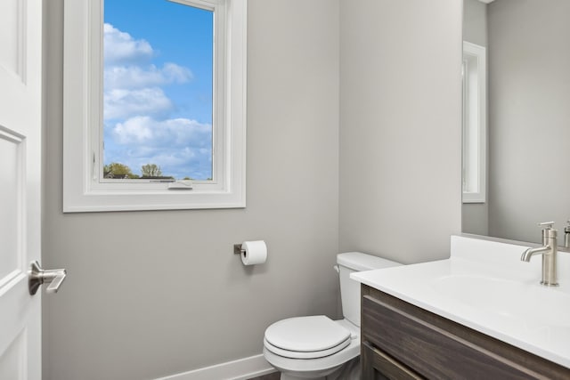 5323 177th St W, Lakeville, MN 55044 - bathroom with toilet, vanity, and baseboards