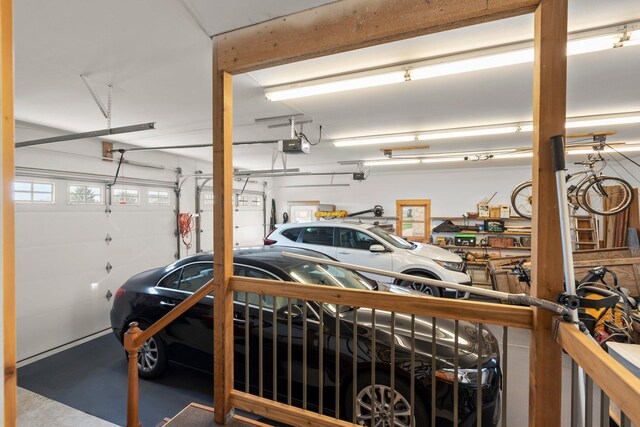 garage featuring a garage door opener