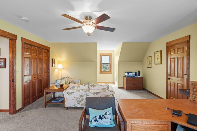 bedroom featuring baseboards, ceiling fan, and light carpet