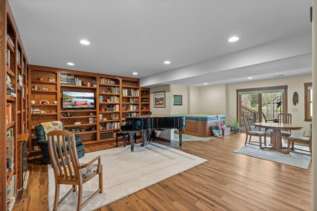 sitting room with recessed lighting and wood finished floors