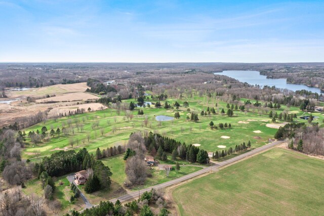bird's eye view featuring a water view and golf course view