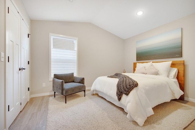 11163 184th Cir NW, Elk River, MN 55330 - bedroom featuring recessed lighting, lofted ceiling, wood finished floors, and baseboards