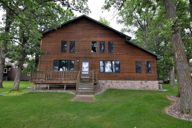 10179 Mounds Point Dr NW, Leech Lake Twp, MN 56633 - back of property featuring a yard and a wooden deck
