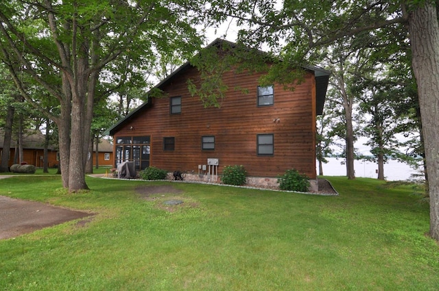 10179 Mounds Point Dr NW, Leech Lake Twp, MN 56633 - back of property featuring a yard