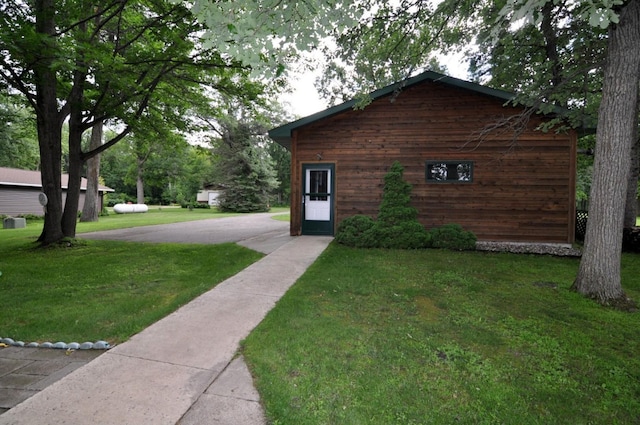 10179 Mounds Point Dr NW, Leech Lake Twp, MN 56633 - view of side of property with a yard