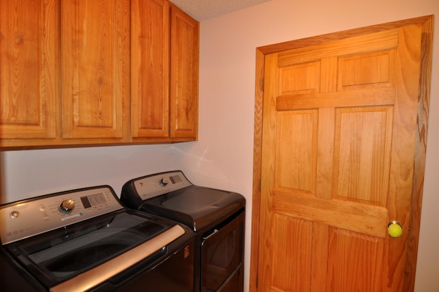 10179 Mounds Point Dr NW, Leech Lake Twp, MN 56633 - washroom with washing machine and clothes dryer and cabinet space