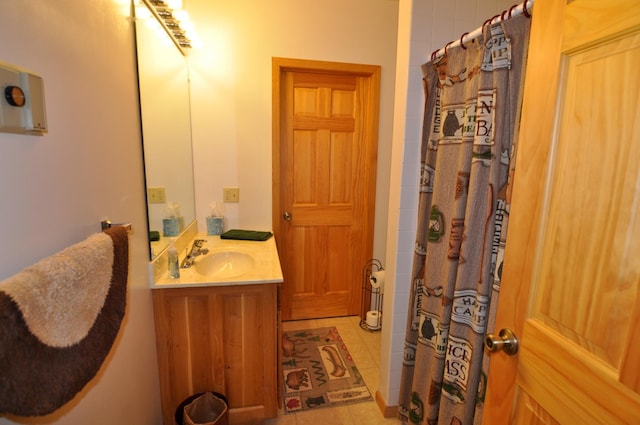10179 Mounds Point Dr NW, Leech Lake Twp, MN 56633 - bathroom with vanity, tile patterned floors, and a shower with shower curtain