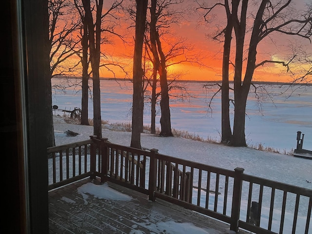 10179 Mounds Point Dr NW, Leech Lake Twp, MN 56633 - deck at dusk featuring a water view