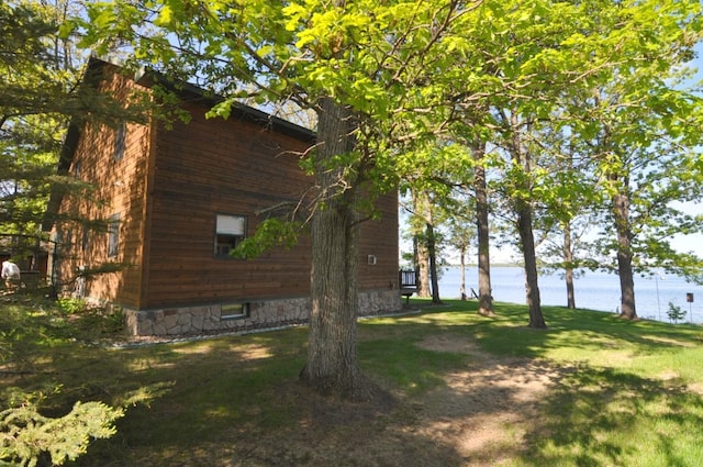 10179 Mounds Point Dr NW, Leech Lake Twp, MN 56633 - view of side of home featuring a water view and a lawn